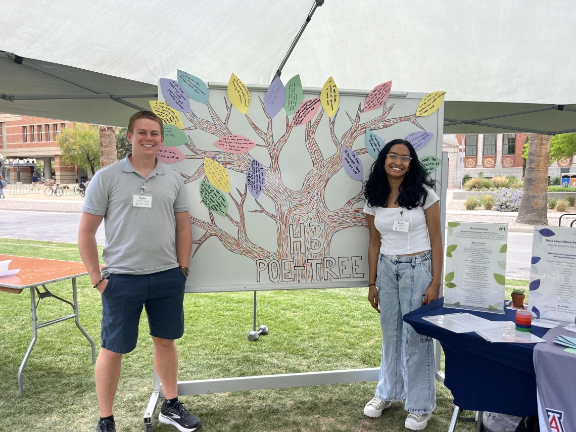 H3 Interdisciplinary Scholars Ryan Haymore and Nagasriya Ramisetty at the Be-Leaf and Bloom event.