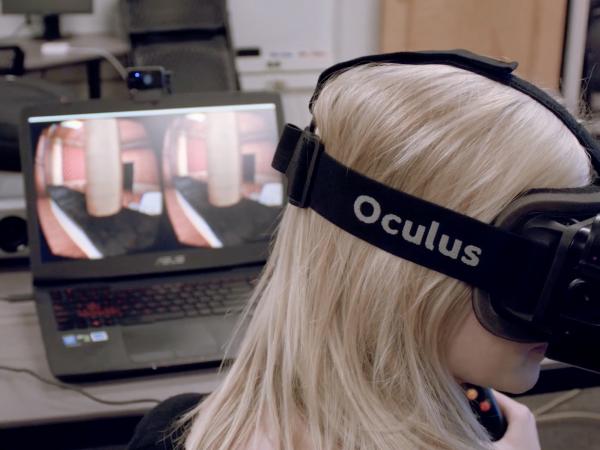 girl using VR headset