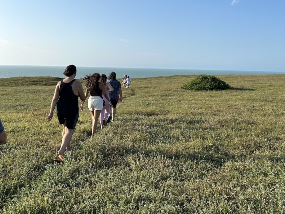 Study Abroad students hiking to Pedra Furada in Brazil's Jericoacoara National Park.