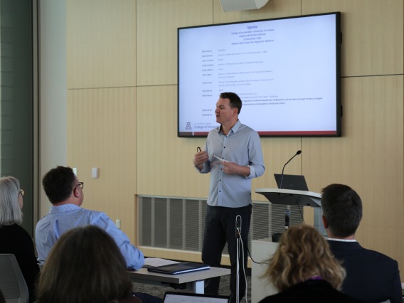 Tommy Lloyd discusses leadership with College of Humanities heads and directors. 